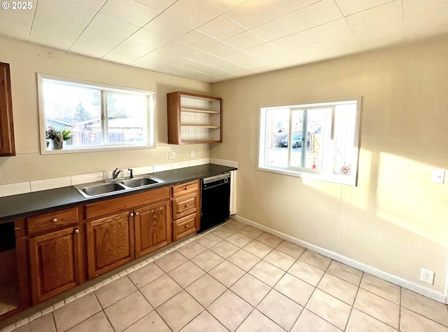 337 Clark St, Eugene, OR 97401 - kitchen featuring dishwasher, dark countertops, brown cabinetry, and open shelves