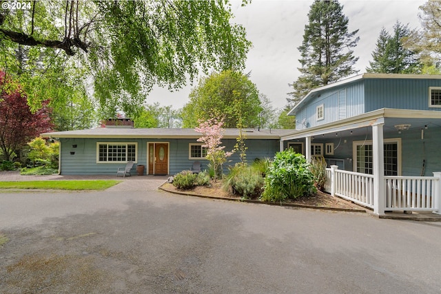 view of front of home featuring covered porch