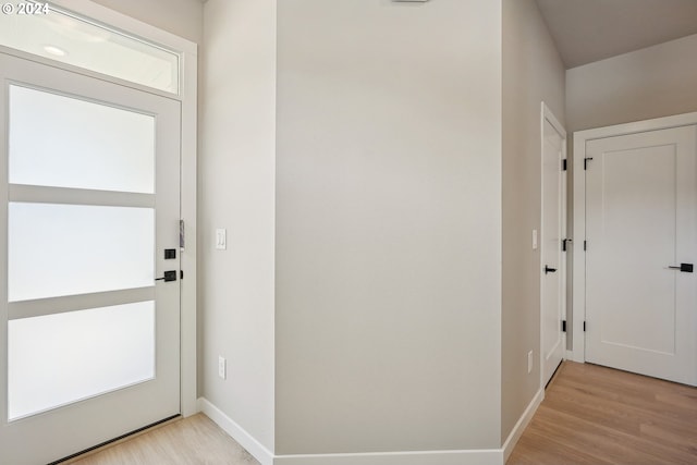 doorway to outside with light hardwood / wood-style flooring