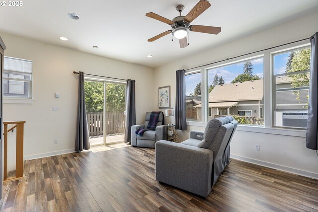 1105 29th St, Hood River, OR 97031 - living area with dark wood finished floors, ceiling fan, cooling unit, recessed lighting, and baseboards
