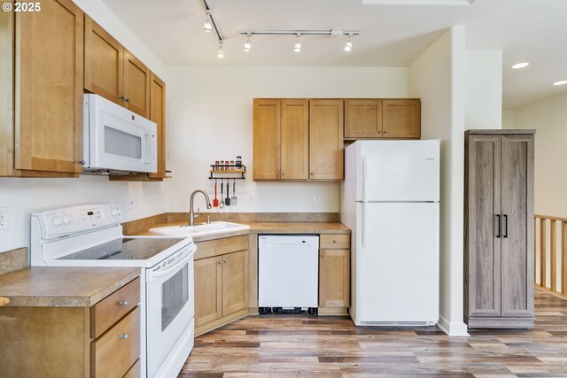 1105 29th St, Hood River, OR 97031 - kitchen with white appliances, a sink, light wood-style flooring, recessed lighting, and light countertops