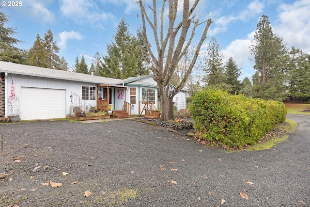 ranch-style home with a garage