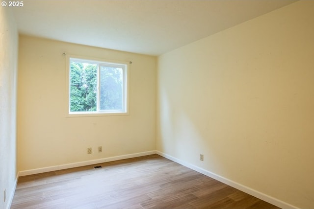 4631 Daisy St, Springfield, OR 97478 - empty room featuring wood finished floors and baseboards