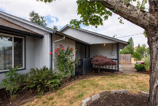 4631 Daisy St, Springfield, OR 97478 - view of property exterior with a porch and a lawn