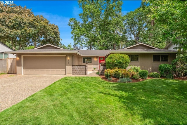 8740 SW Bomar Ct, Portland, OR 97223 - ranch-style home with an attached garage, concrete driveway, a front yard, and board and batten siding