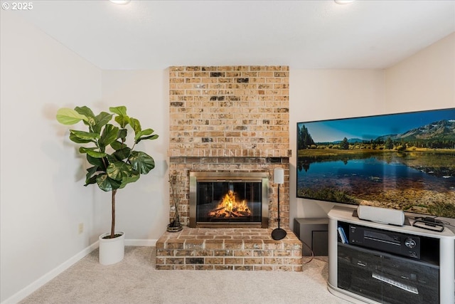 8740 SW Bomar Ct, Portland, OR 97223 - carpeted living area with a brick fireplace and baseboards