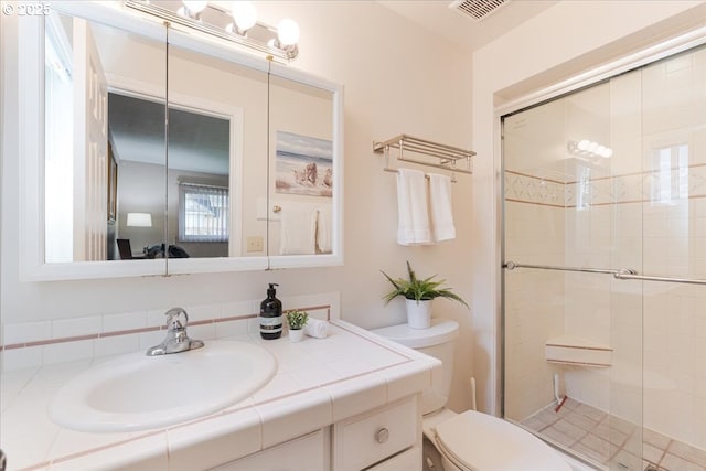 8740 SW Bomar Ct, Portland, OR 97223 - full bath with a stall shower, vanity, and toilet