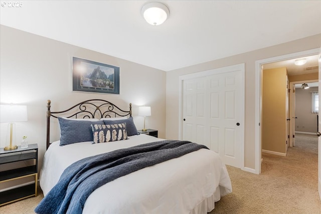 8740 SW Bomar Ct, Portland, OR 97223 - bedroom with light colored carpet, baseboards, and a closet