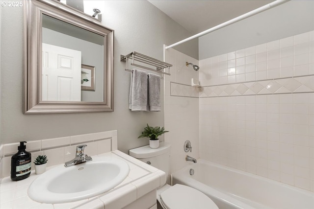 8740 SW Bomar Ct, Portland, OR 97223 - full bathroom featuring toilet, vanity, and  shower combination