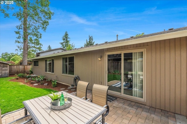 8740 SW Bomar Ct, Portland, OR 97223 - rear view of house featuring a patio and outdoor dining area