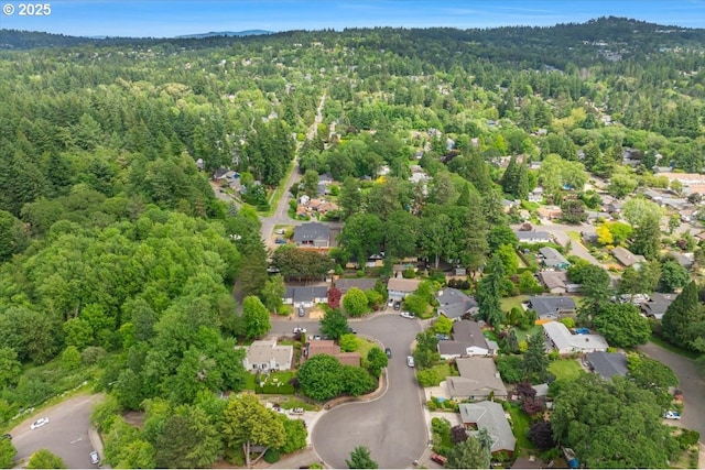 8740 SW Bomar Ct, Portland, OR 97223 - aerial overview of property's location with a heavily wooded area and nearby suburban area
