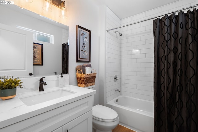 bathroom with shower / bath combo with shower curtain, toilet, wood finished floors, and vanity