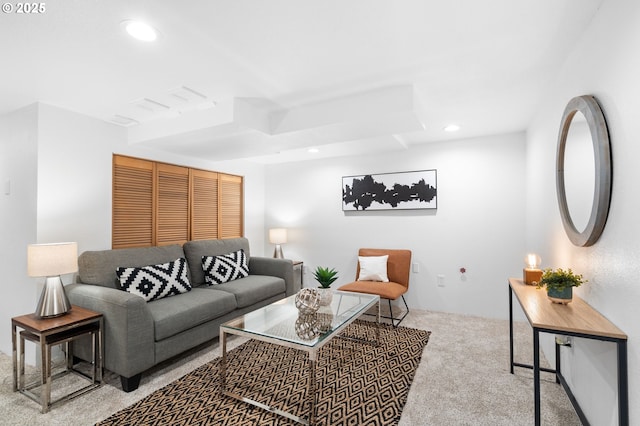 carpeted living area featuring recessed lighting