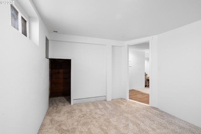unfurnished room featuring carpet flooring