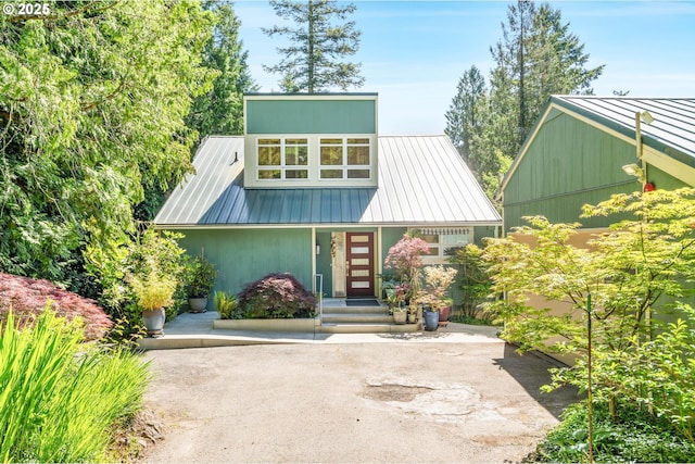 16448 NW Mcnamee Rd, Portland, OR 97231 - mid-century inspired home featuring metal roof