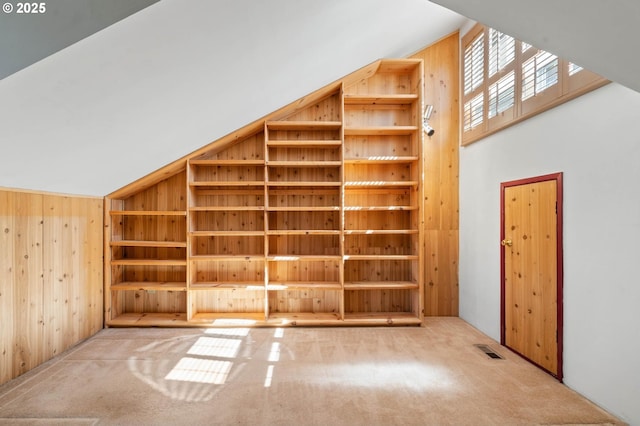 16448 NW Mcnamee Rd, Portland, OR 97231 - bonus room featuring wooden walls, carpet, and high vaulted ceiling