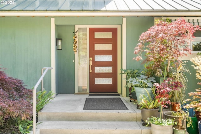 16448 NW Mcnamee Rd, Portland, OR 97231 - view of exterior entry featuring a standing seam roof and metal roof