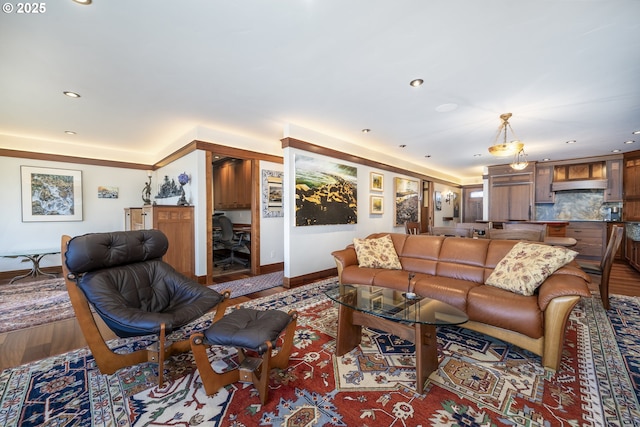 1 3rd St Unit 501, Astoria, OR 97103 - living area with baseboards, wood finished floors, and recessed lighting