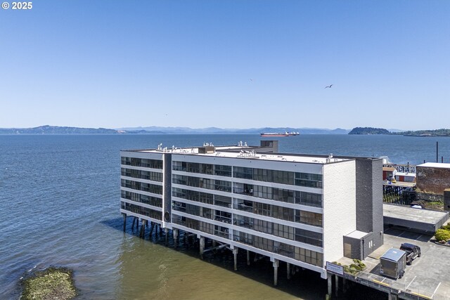 1 3rd St Unit 501, Astoria, OR 97103 - view of building exterior featuring a water and mountain view