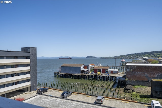 1 3rd St Unit 501, Astoria, OR 97103 - water view featuring a mountainous background and fence