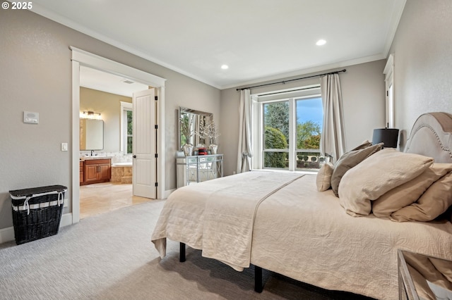bedroom with crown molding, recessed lighting, light carpet, baseboards, and connected bathroom