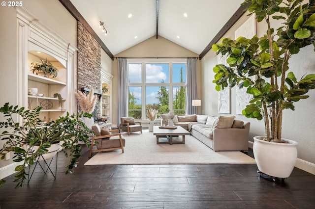 living room featuring beam ceiling, high vaulted ceiling, hardwood / wood-style flooring, and baseboards