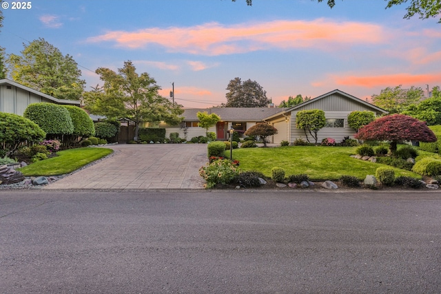 2691 Country Ln, Eugene, OR 97401 - view of front of house featuring decorative driveway and a front yard