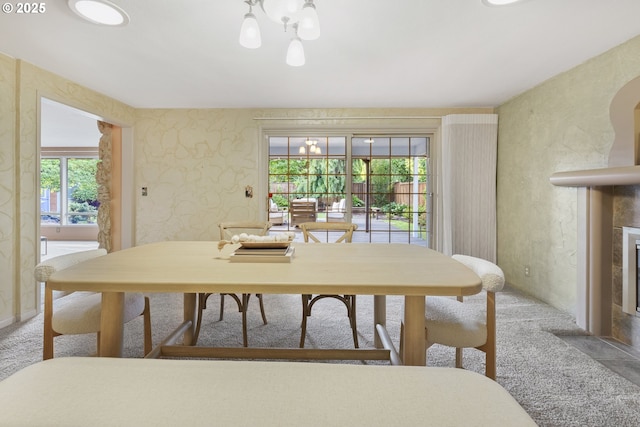 2691 Country Ln, Eugene, OR 97401 - dining room with healthy amount of natural light, a chandelier, and carpet