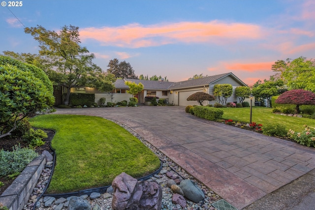 2691 Country Ln, Eugene, OR 97401 - ranch-style house featuring asphalt driveway, an attached garage, and a front yard
