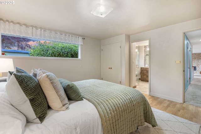 2691 Country Ln, Eugene, OR 97401 - bedroom featuring light wood-style floors and ensuite bath