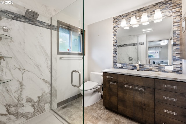 2691 Country Ln, Eugene, OR 97401 - full bath featuring a marble finish shower, vanity, and backsplash