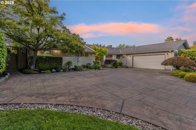 2691 Country Ln, Eugene, OR 97401 - ranch-style house with driveway, a garage, and a chimney