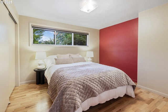 2691 Country Ln, Eugene, OR 97401 - bedroom featuring light wood-type flooring and a closet