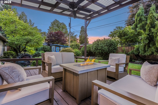 2691 Country Ln, Eugene, OR 97401 - wooden terrace with ceiling fan, an outdoor living space with a fire pit, a pergola, and a shed