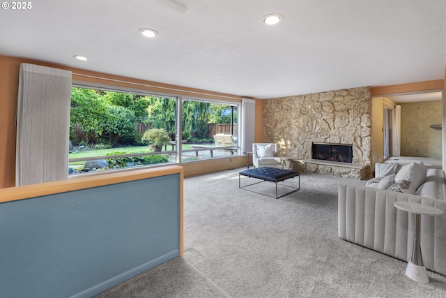 2691 Country Ln, Eugene, OR 97401 - carpeted living room with a stone fireplace and recessed lighting