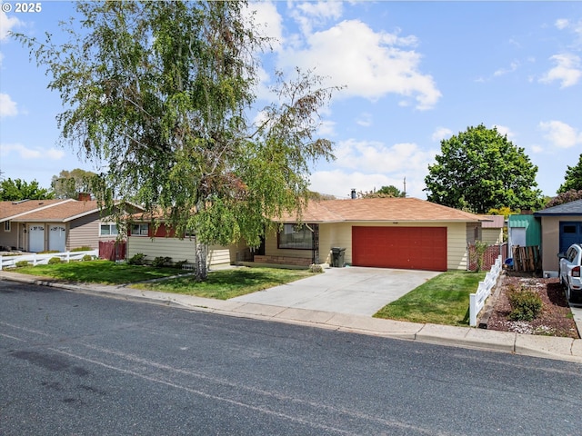 1550 Ash St, Baker City, OR 97814 - view of front facade featuring a garage and driveway