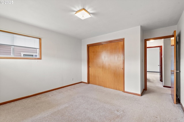 1550 Ash St, Baker City, OR 97814 - unfurnished bedroom featuring carpet, baseboards, and a closet
