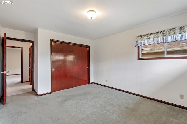1550 Ash St, Baker City, OR 97814 - unfurnished bedroom featuring carpet, baseboards, and a closet