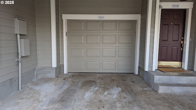 garage featuring driveway