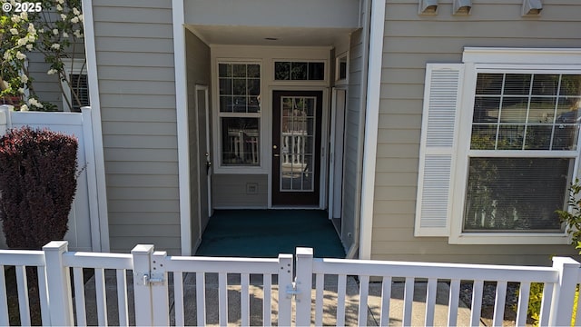 property entrance with fence