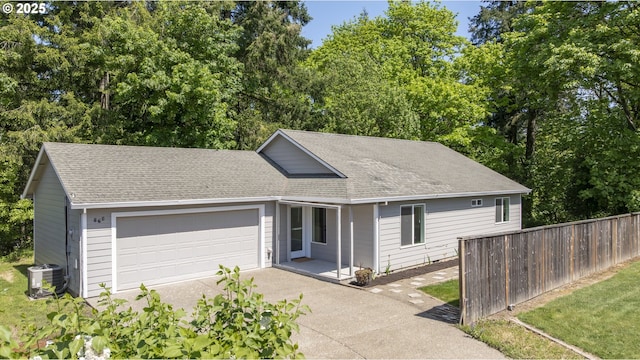 865 SE Roberts Ct, Mcminnville, OR 97128 - single story home featuring fence, concrete driveway, central AC, and roof with shingles