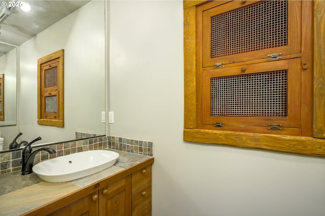 865 SE Roberts Ct, Mcminnville, OR 97128 - bathroom featuring vanity and tasteful backsplash