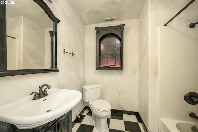 865 SE Roberts Ct, Mcminnville, OR 97128 - full bathroom with visible vents, toilet, washtub / shower combination, tile patterned floors, and a sink