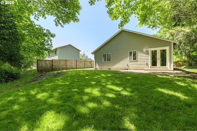 865 SE Roberts Ct, Mcminnville, OR 97128 - back of house featuring fence, a patio, a lawn, and french doors