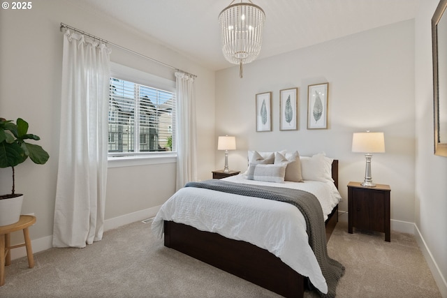 16943 SW Snowdale St, Beaverton, OR 97007 - carpeted bedroom featuring a chandelier and baseboards
