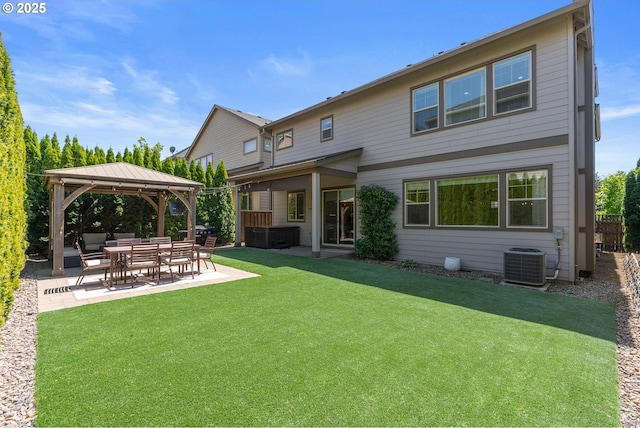 16943 SW Snowdale St, Beaverton, OR 97007 - back of house with central AC unit, a gazebo, a patio area, and a yard