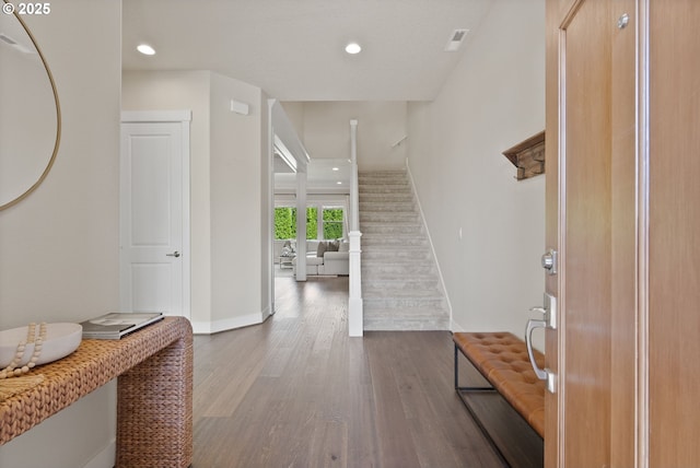 16943 SW Snowdale St, Beaverton, OR 97007 - foyer entrance with wood finished floors, baseboards, recessed lighting, and stairs