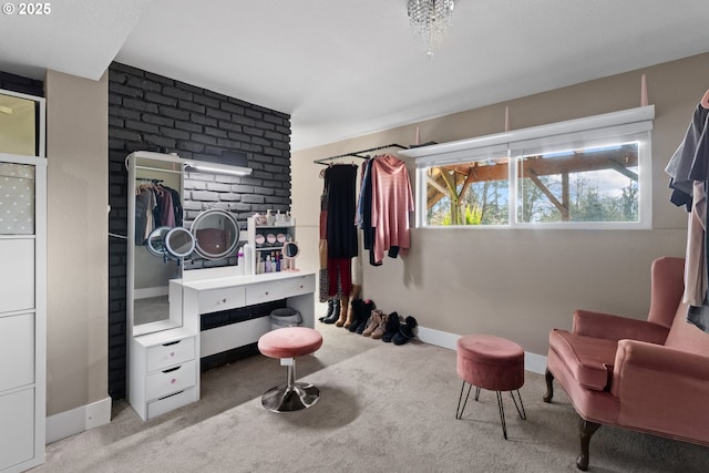 carpeted bedroom featuring baseboards