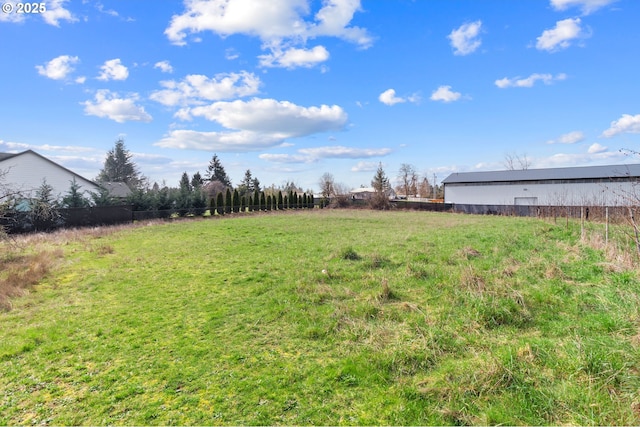 view of yard with fence