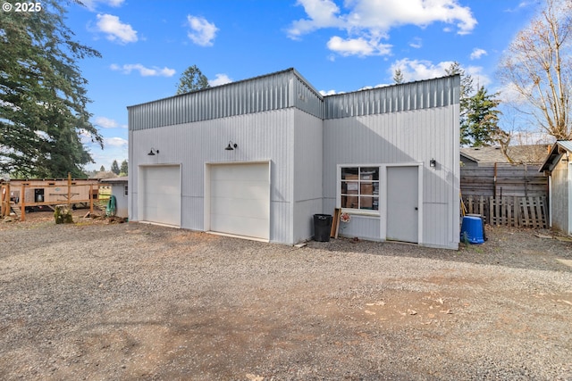 garage with fence